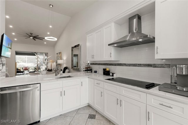 kitchen with dishwasher, lofted ceiling, black electric stovetop, white cabinets, and wall chimney exhaust hood