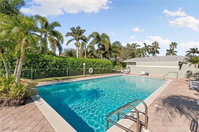 view of pool featuring a patio area