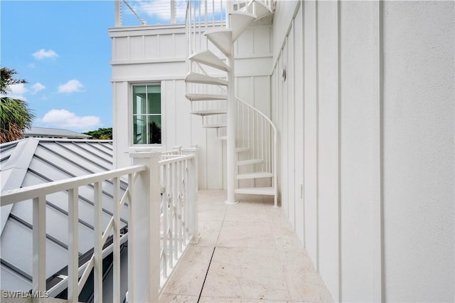 entrance to property featuring board and batten siding