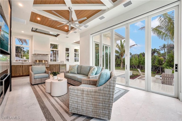 living room with coffered ceiling, recessed lighting, visible vents, and beamed ceiling