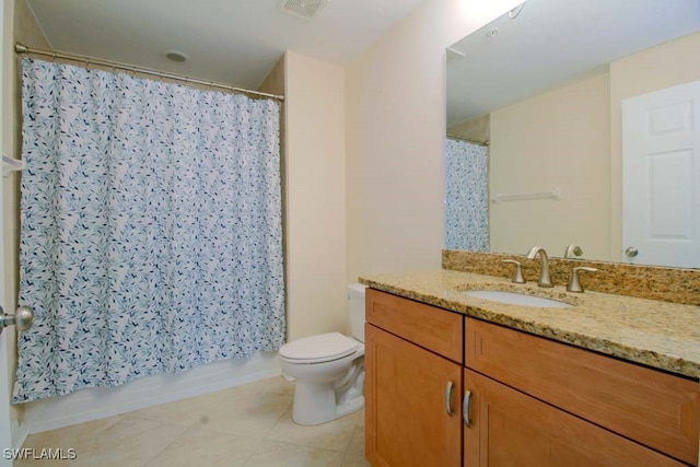 full bathroom featuring tile patterned flooring, vanity, shower / tub combo with curtain, and toilet