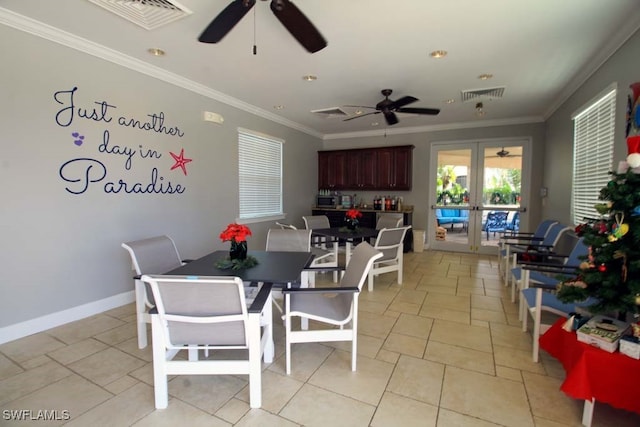 dining room featuring ceiling fan, french doors, and ornamental molding