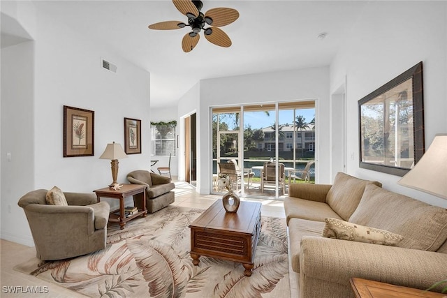 living room featuring ceiling fan