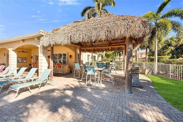 view of patio featuring a gazebo and ceiling fan