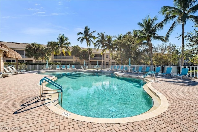 view of swimming pool with a patio