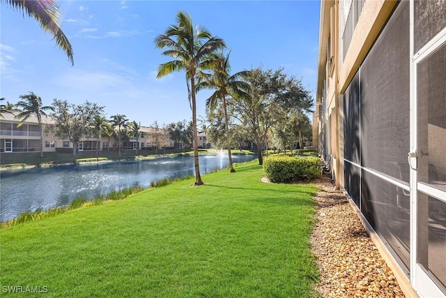 view of yard with a water view