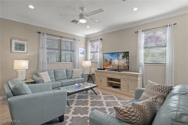 living room featuring ceiling fan, light tile patterned flooring, and crown molding