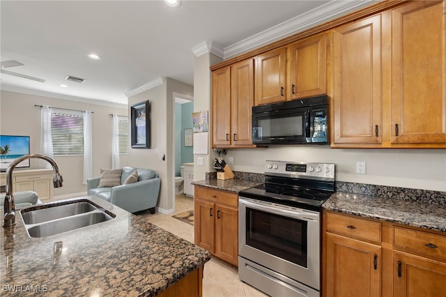 kitchen featuring stainless steel range with electric stovetop, ornamental molding, dark stone countertops, and sink