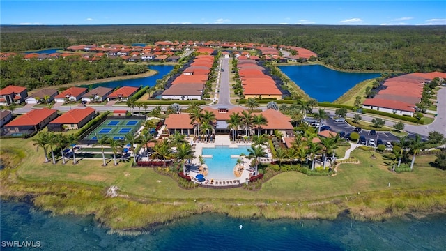 bird's eye view with a water view