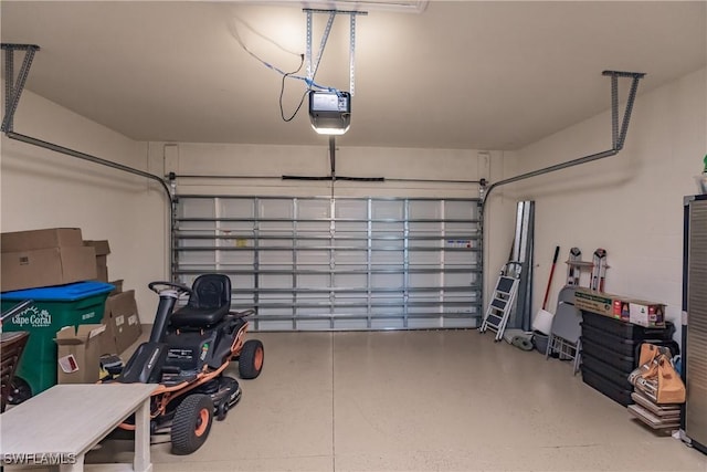 garage featuring a garage door opener