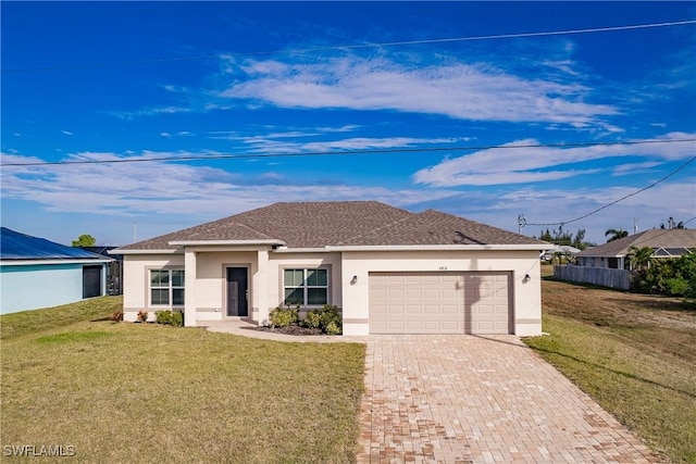 single story home with an attached garage, a shingled roof, decorative driveway, stucco siding, and a front lawn