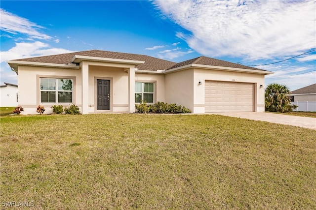 view of front of house featuring a garage, concrete driveway, a front yard, and stucco siding