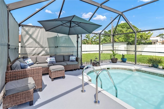 view of swimming pool with a lawn, an outdoor living space, a patio area, and a lanai