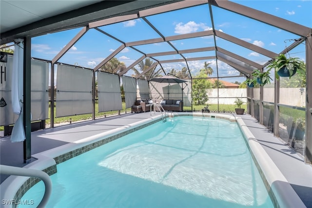 view of pool with a lanai