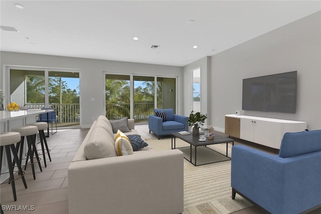 tiled living room with a wealth of natural light