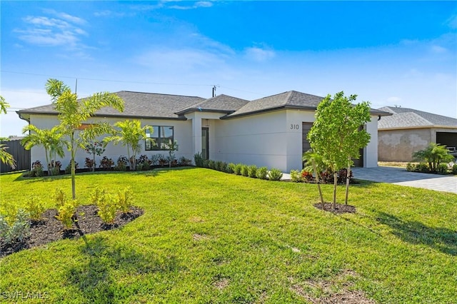 single story home with a front lawn