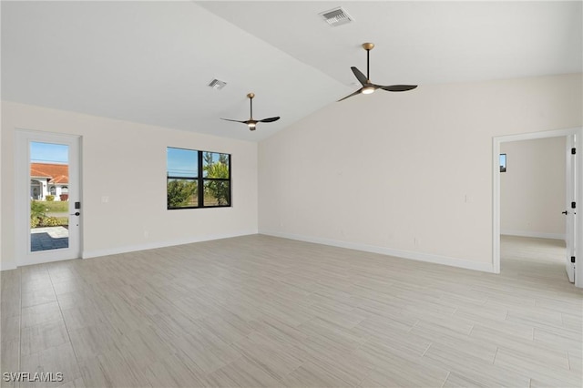 unfurnished room featuring lofted ceiling and ceiling fan