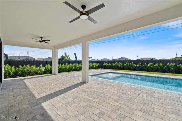 view of pool featuring a patio area and ceiling fan