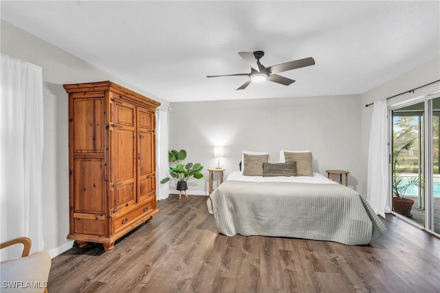 bedroom featuring wood finished floors, a ceiling fan, baseboards, and access to outside