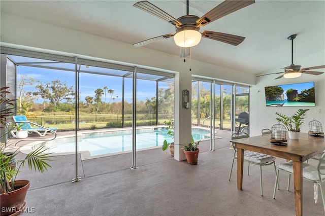 view of swimming pool with ceiling fan