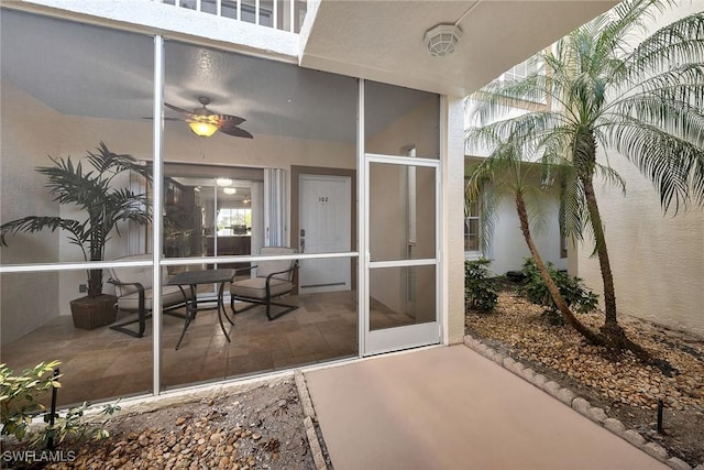 view of patio featuring ceiling fan