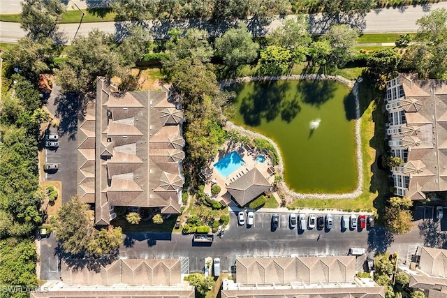 bird's eye view with a water view