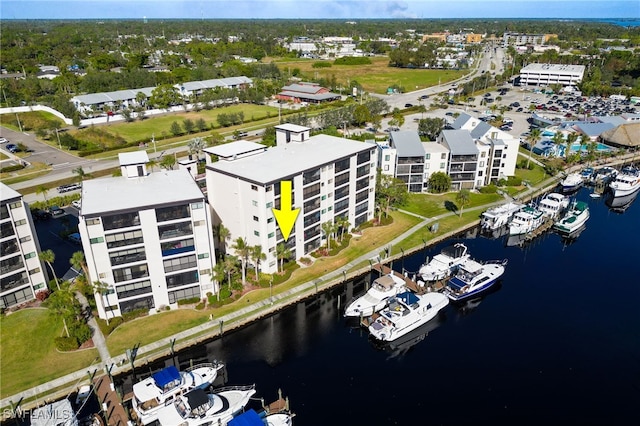 drone / aerial view with a water view