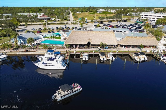 birds eye view of property featuring a water view