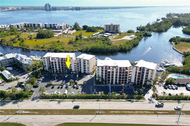 drone / aerial view with a water view