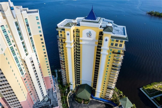 view of building exterior with a water view
