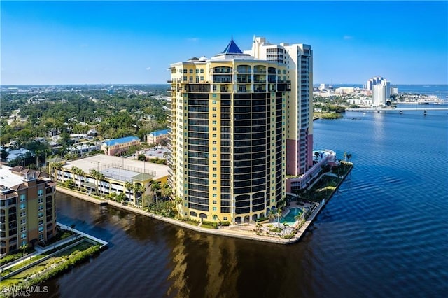 aerial view with a city view and a water view