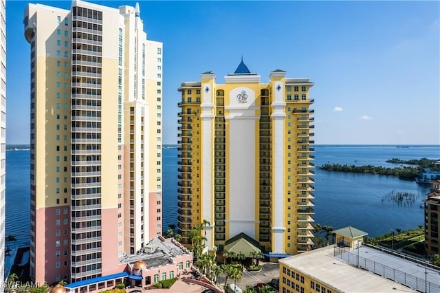 view of building exterior with a water view