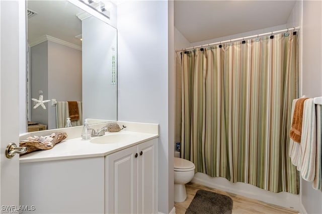 bathroom featuring vanity, shower / bathtub combination with curtain, crown molding, toilet, and visible vents