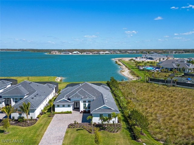 aerial view with a water view and a residential view