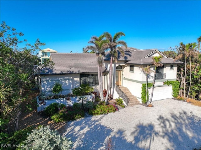 view of front of property with a garage