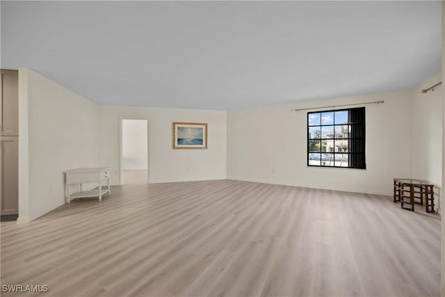 unfurnished living room featuring light wood-type flooring