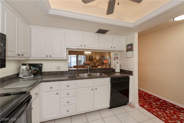 kitchen with white cabinets, light tile patterned floors, black dishwasher, and sink