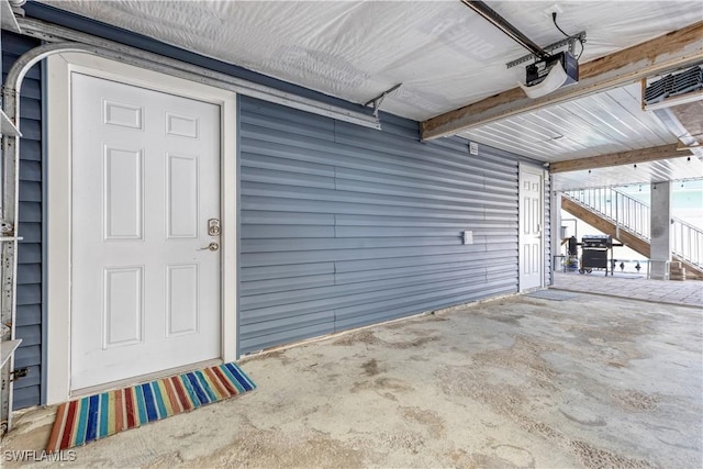 garage featuring a garage door opener