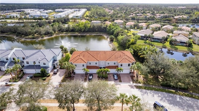 bird's eye view with a water view and a residential view