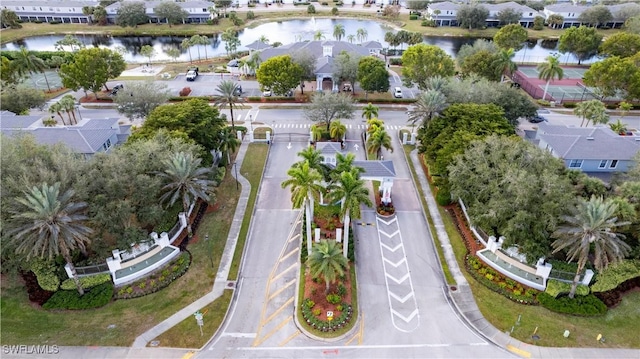 bird's eye view featuring a water view and a residential view