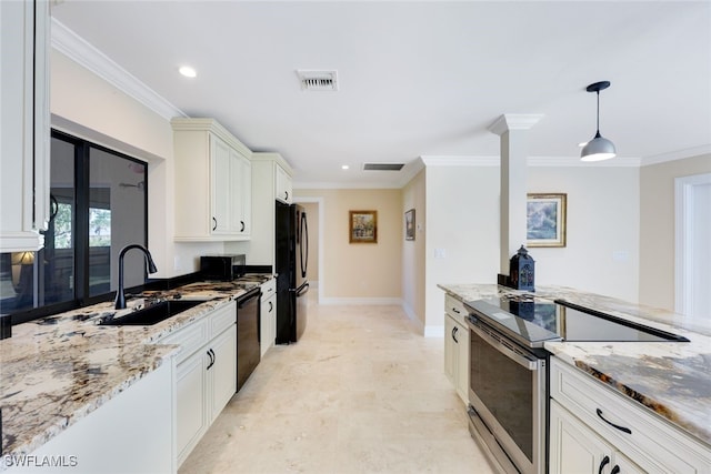 kitchen featuring sink, hanging light fixtures, light stone counters, black appliances, and ornamental molding