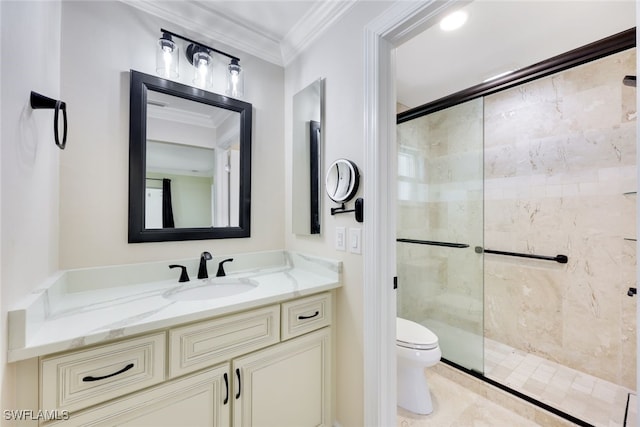 bathroom with vanity, toilet, an enclosed shower, and crown molding