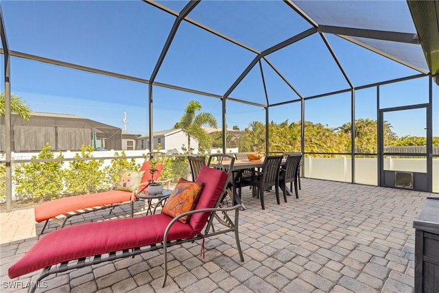 view of patio / terrace with a lanai