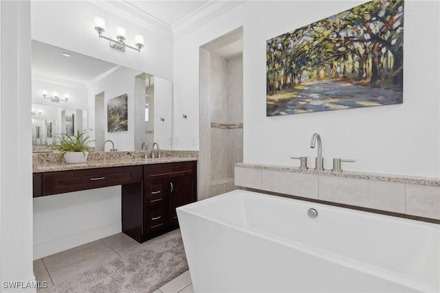 bathroom featuring a bathing tub, tile patterned flooring, vanity, and ornamental molding