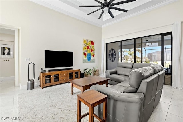 tiled living room featuring crown molding and ceiling fan