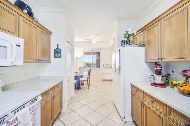 kitchen featuring light tile patterned floors, white appliances, ceiling fan, and crown molding