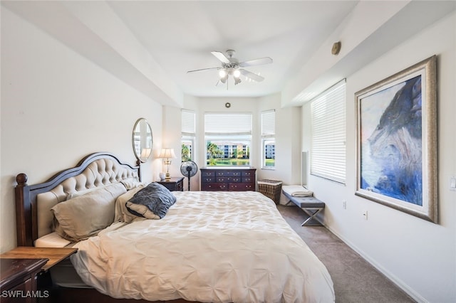 carpeted bedroom featuring ceiling fan