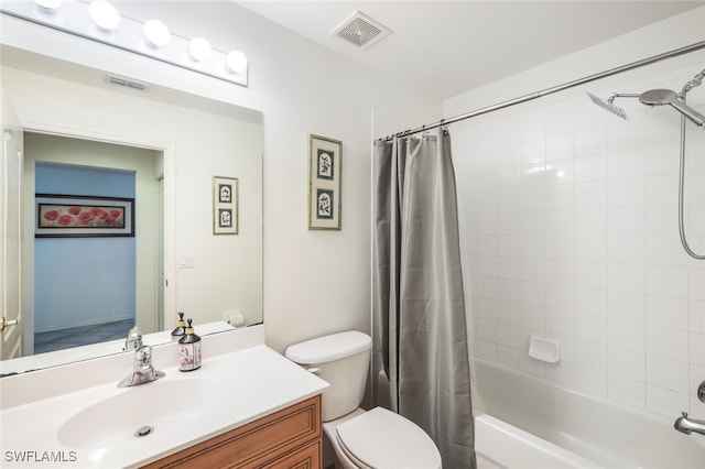 full bathroom with vanity, shower / bath combination with curtain, and toilet