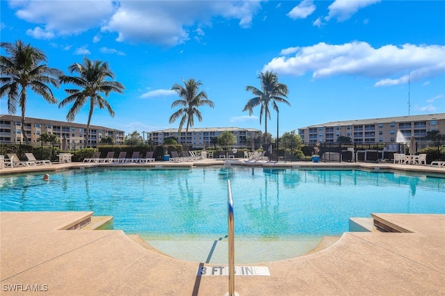 view of swimming pool featuring a patio area