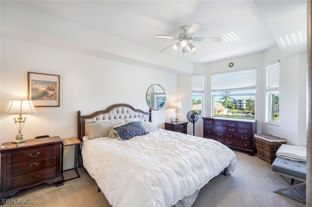 carpeted bedroom with ceiling fan